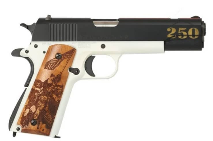 Auto-Ordnance 1911A1 Marines 250th Anniversary .45 ACP 5 inch pistol with white frame, blue slide, and engraved hardwood grip