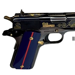 Elegant engraved pistol with gold accents and custom design.