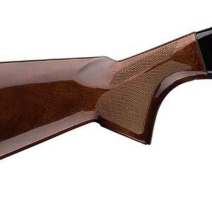 Vintage hunting rifle with wooden stock and metal barrel.